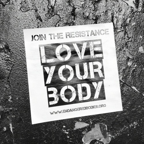 sign that reads 'Join the resistance, love your body, www.endangeredbodies.org' (link to file)