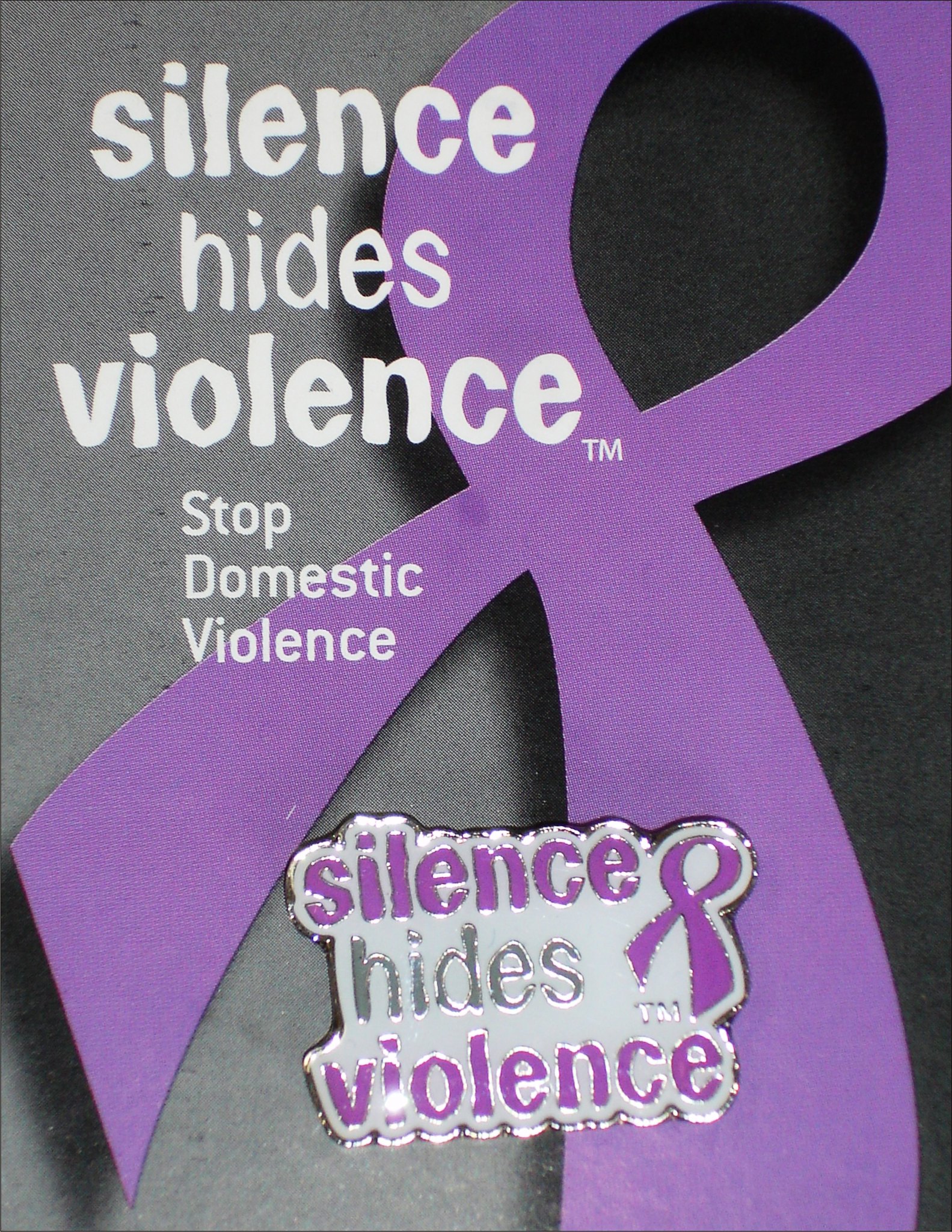 pin that reads 'Silence hides violence' (link to file)