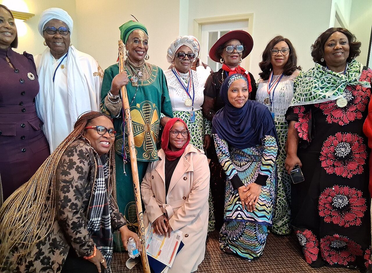 A group of African women in colorful clothing