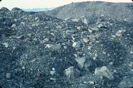 Photograph of a moraine (pile of boulders of different sizes)