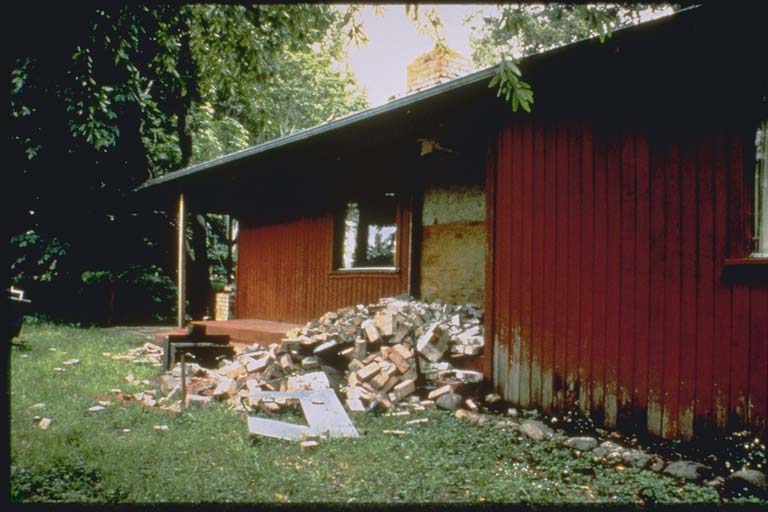 Brick chimney on this house in Petrolia, California, collapsed during the 1992 Cape Mendocino Earthquake